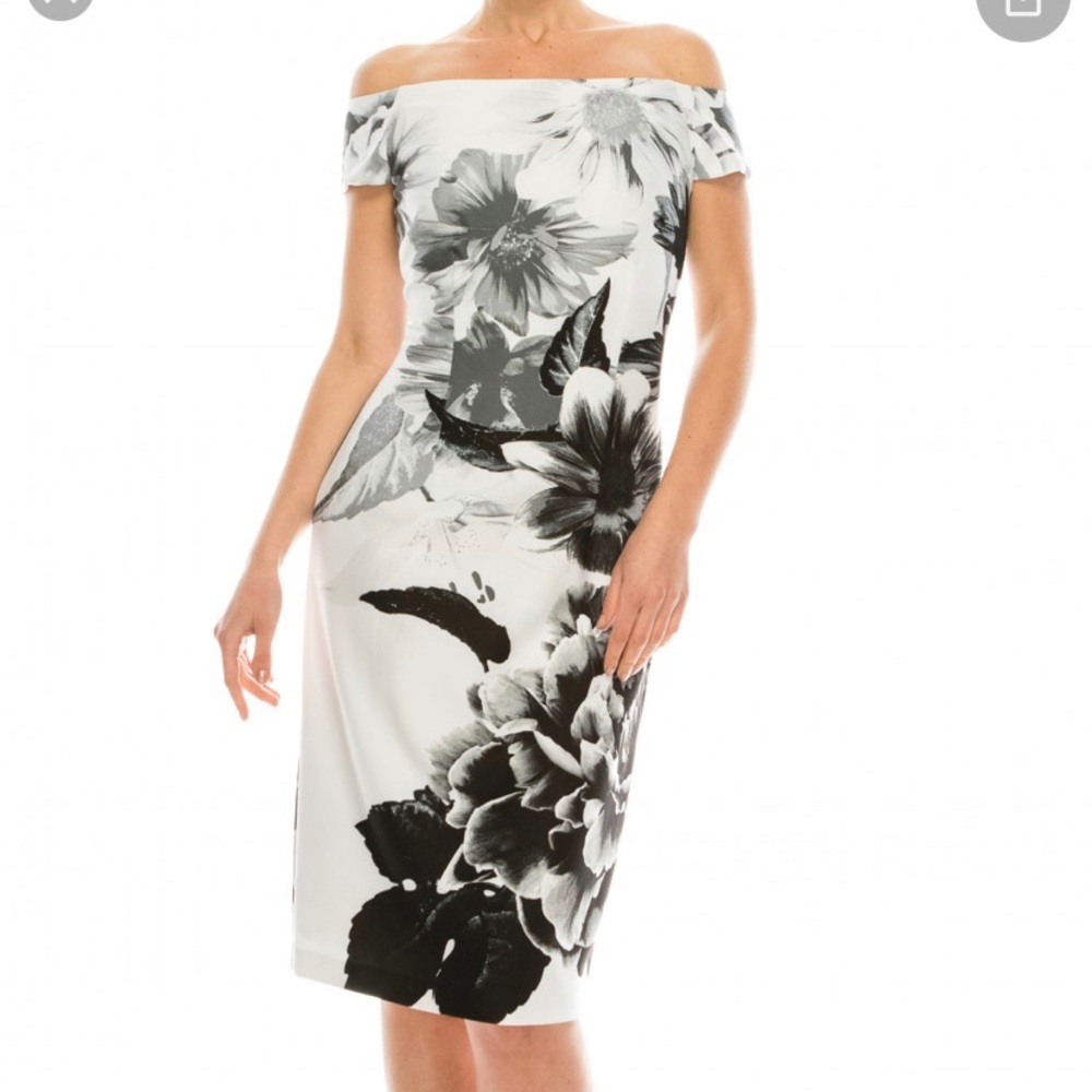 Beautiful dress.New with tagnever had a chance to wear it,then I gained weight.